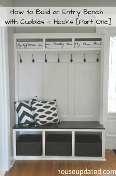 the entryway bench has two storage baskets under it and is decorated with black and white accents