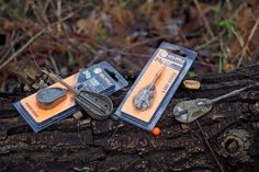 some tools are laying on top of a log