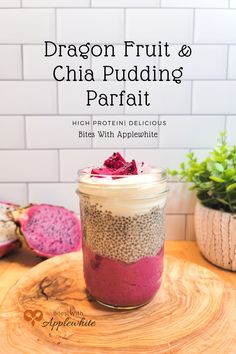 dragon fruit and chia pudding parfait in a jar on a wooden table