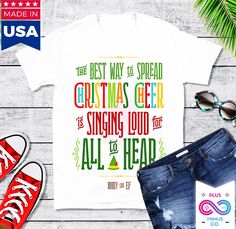 "Christmas Cheer Shirt, The Best Way to Spread Christmas Cheer is Singing Loud For All to Hear, Christmas Shirt, Christmas Gift, Xmas Shirt Spread the Christmas Cheer with this bright and colorful shirt! It's often difficult to get the holiday cheer up with what is going on but it is nice to remind ourselves and others that this too shall pass so might as well enjoy it while we can! Don't let anything ruin Christmas! The unisex soft-style t-shirt puts a new spin on casual comfort. Made from very Elf Quotes, Cheer Shirt, Creative Shirts, Cheer Shirts, Bff Necklaces, This Too Shall Pass, Buddy The Elf, Plus And Minus, Xmas Shirts