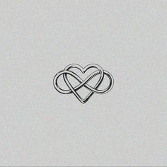 two intertwined hearts in the middle of a gray background