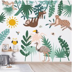 an animal themed wall mural in a child's room with jungle animals and birds