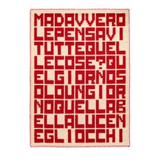 a red and white rug with words on it