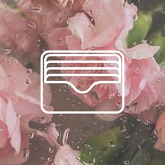 pink flowers with raindrops on them and a credit card in the middle that says,