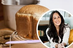 a woman sitting at a table with a loaf of bread in front of her and an image of a loaf of bread on a wire rack