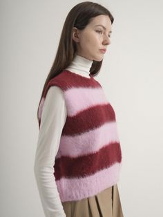 Composition : acrylic 55% + nylon 20% + wool 20% + alpaca 5%Color : Pink_freeCountry of Origin : Republic of Korea Casual Pink Wool Sweater, Pink Fitted Wool Sweater, Fitted Pink Wool Sweater, Winter Pink Knit Tops, Pink Knit Winter Top, Pink Knit Top For Winter, Fitted Pink Sweater Vest For Fall, Pink Mohair Sweater For Spring, Pink Wool Knitted Sweater