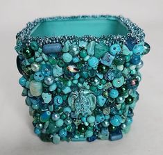 Turquoise Color Hand Beaded Trinket Jar Holder Cup Vase 3.25 x 3.25 x 3 Upcycled Inside measurements are 2 3.8in x 2 3/8in and 2.75in deep Hand glued beads on a recycled glass container Great for bedside, desk, or bath Smoke free, pet friendly environment All offers considered No handling fees. Trinket Jar, Bedside Desk, Handmade Inspiration, 2024 Christmas, Glass Containers, Turquoise Color, Recycled Glass, Hand Beading, Pet Friendly