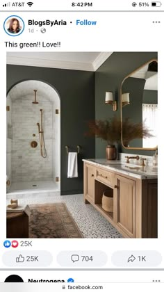 the bathroom is decorated in shades of green and gold, with an arched shower door