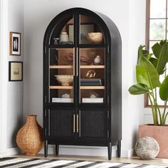 Buy Member's Mark Enzo Bookcase Storage Cabinet With Rattan Cabinet Doors, Black Finish : Bookcases & Storage Cabinets at SamsClub.com Rattan Cabinet Doors, Black Display Cabinet, Rattan Cabinet, Wide Bookcase, Cabinet With Glass Doors, Salon Suites, Black Cabinet, Organization Furniture, Cabinet Door Handles