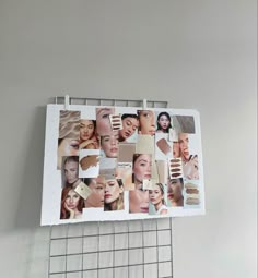 there are many different pictures on the wall and one is being cut out to look like a collage