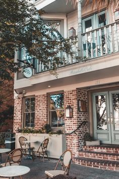 an outdoor patio with chairs and tables in front of a building that says 8 off the best places to eat in savannah, georgia