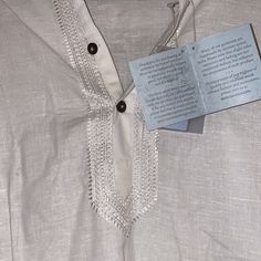 Authentic Indian Branded Shirt. Extremely Light Weight, And Cool To Wear For Summer. Traditional Hand Embroidery White Summer Shirt With Chikankari Embroidery, Traditional Linen Tops With Chikankari Embroidery, Festive White Cotton Shirt, Casual Cotton Shirt With Chikankari Embroidery, White Cotton Shirt With Chikankari Embroidery, White Cotton Chikankari Embroidered Shirt, Traditional White Linen Shirt, Casual Short Sleeve Kurta For Festive Occasions, White Casual Top For Festive Season