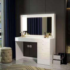 a white vanity with a mirror and lights on it in front of a blue curtained window