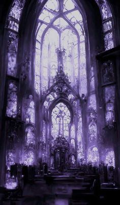 the inside of a church with stained glass windows