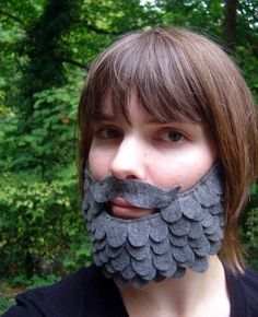 a woman with a fake beard and moustache