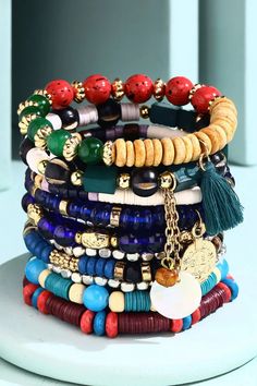 Whimsical bohemian layered multi bead stretch bracelet set.*Wood/Metal/Glass Some Text, Beauty Sale, Beaded Stretch Bracelet, Wood Metal, Holiday Collection, Stretch Bracelet, Stretch Bracelets, Wood And Metal, Bracelet Set