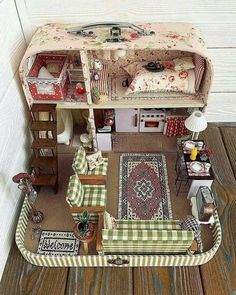 a doll house is shown with furniture and accessories