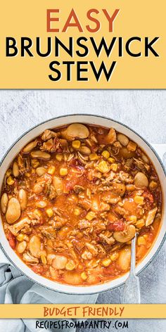 a pot filled with beans and stew next to a spoon