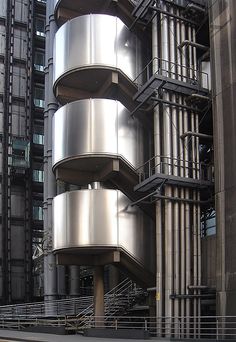 a tall building with many balconies on it's sides