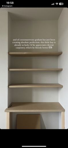 an empty shelf with some writing on it