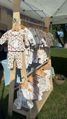 baby clothes on display at an outdoor event