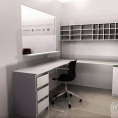 a desk with a mirror and chair in a room that has shelves on the wall