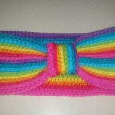 a crocheted headband with multicolored stripes