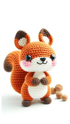 a crocheted stuffed animal that looks like a fox