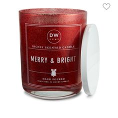 merry and bright candle in a red glass with white lid, on a white background