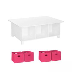 a white table with red bins next to it and three storage boxes on each side