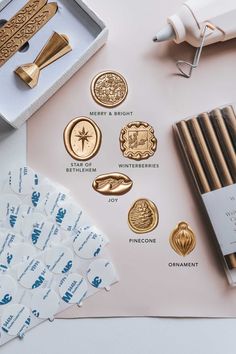 some gold and white items on a table