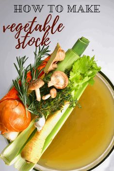 a plate filled with vegetables and soup on top of a table