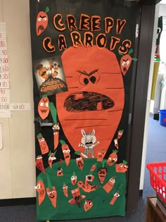 a classroom door decorated with an image of a cartoon character and the words creepy carrots