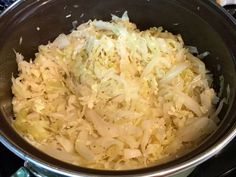 the food is being cooked in the pot on the stove