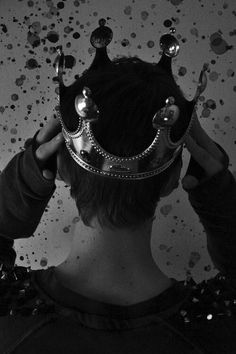 a person with a crown on their head