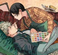 two people laying on a couch with an artist's palette in their hand,