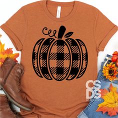 a t - shirt with an image of a pumpkin on it