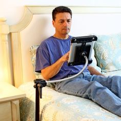 Heavy-Duty iPad & Tablet SnakeClamp attached to Bed Post provides the best way to mount your iPad or eReader in bed! Disabled Bedroom, Ipad Holder For Bed, Adaptive Equipment Diy, Helpful Gadgets, Future Christmas, Bedside Caddy, Laptop Desk For Bed, Estate Planning Checklist, Bed With Posts