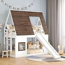 a child's play house with a slide in the middle