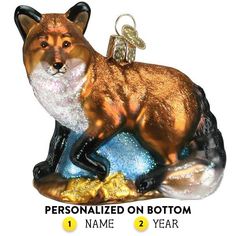 a glass ornament with an image of a fox on it's back