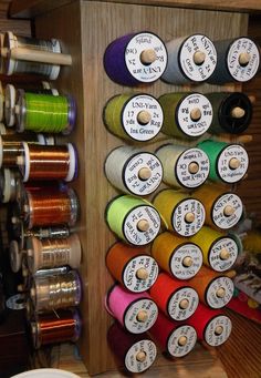 many spools of thread are on the shelf