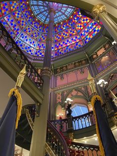 the inside of a building with stained glass windows