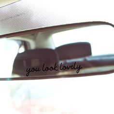 you look lovely written on the side mirror of a car's rear view mirror