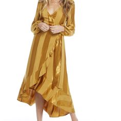 Saltwater Luxe - Gold Wrap Dress Size: M Be A Ray Of Sunshine On A Cloudy Day In This Bright Midi Dress With A Flattering Wrap Silhouette And Poet Sleeves. Amber, Golden Yellow Tia Wrap Dress Fabric Content: Woven 60% Viscose 40% Rayon Brand: Saltwater Luxe No Trades, But Offers Will Be Considered. Do You Have Any Questions About The Item? Feel Free To Message Me! Gold Long Sleeve Midi Dress For Summer, Chic Gold Vacation Dress, Chic Gold Dress For Vacation, Gold Long Sleeve Summer Dress, Spring Long Sleeve Gold Midi Dress, Gold Long Sleeve Midi Dress For Spring, Chic Gold Maxi Dress For Brunch, Chic Flowy Gold Dress, Chic Gold Flowy Dress