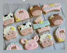 some decorated cookies with farm animals on them