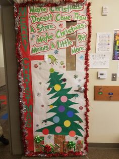 a decorated door with a christmas tree on it