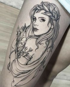 a woman's leg with a tattoo on it and flowers in her hair, holding an arrow