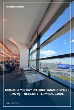 A lounge at Chicago Midway International Airport (MDW) with comfortable seating and tables along large windows. The view outside features a Southwest Airlines plane parked at the gate under a bright blue sky with scattered clouds.