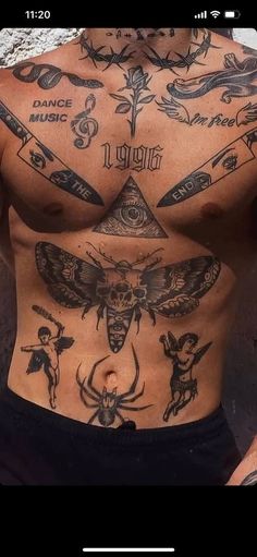 a man with lots of tattoos on his chest