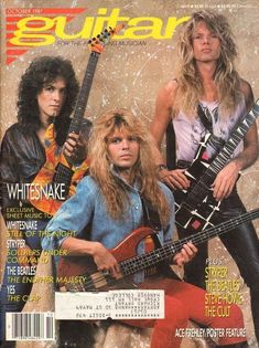 the cover of guitar magazine with two women and one man playing bass guitars on it